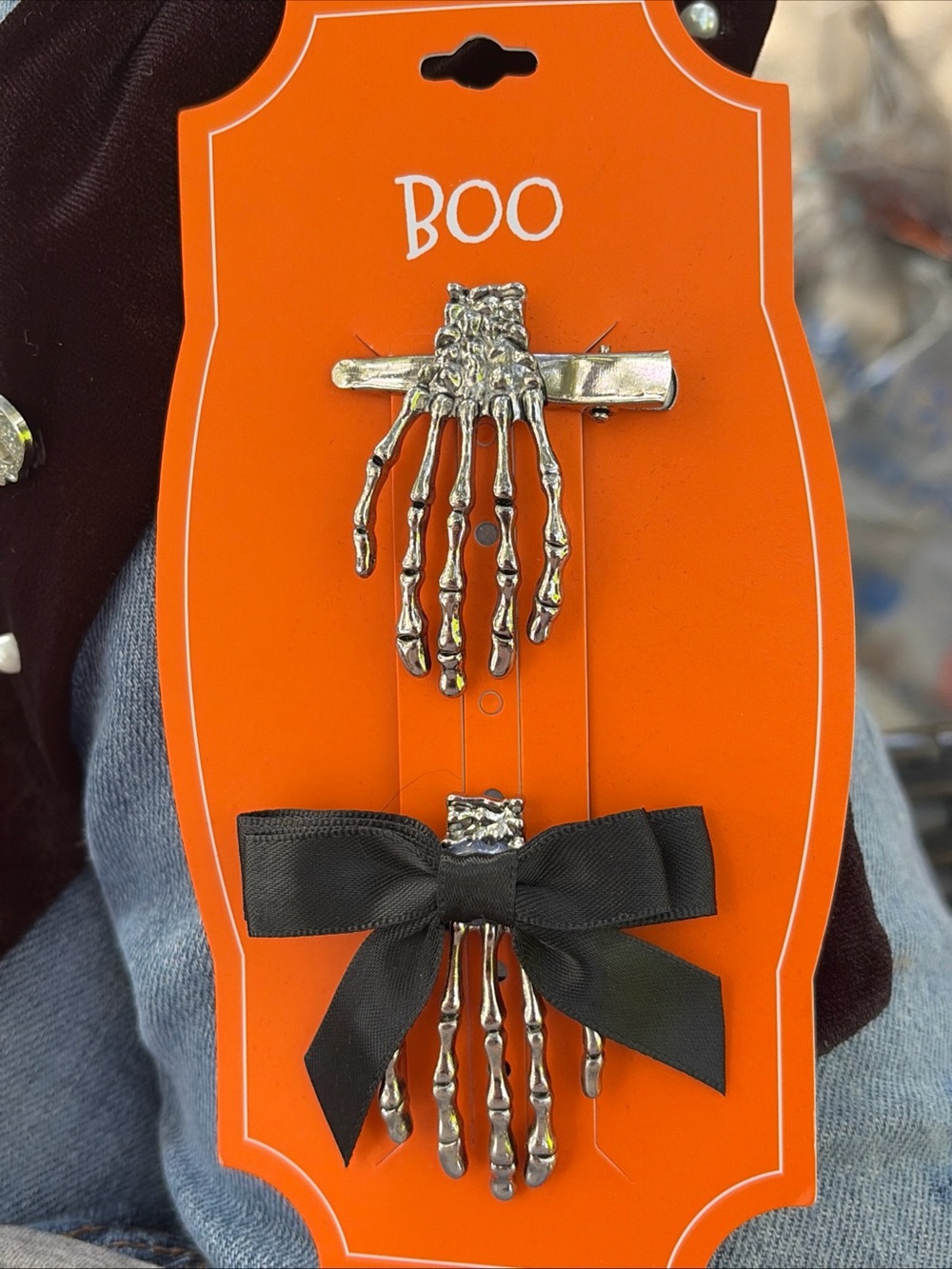 Boohoo Silver Skeleton Hand Hair Clips with Black Bow